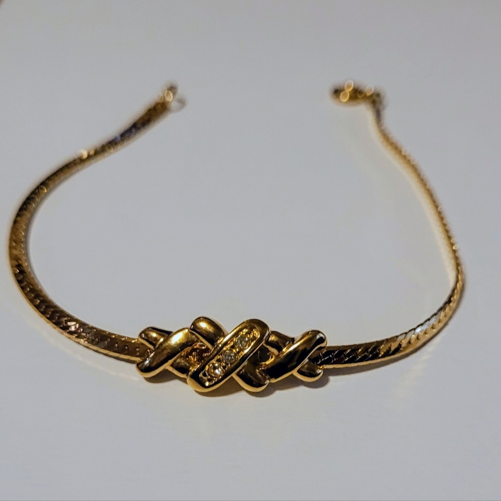 Avon X Designs On Gold-Tone Braclet. Middle Symbol X Has CZs